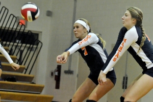 SUN PHOTO BY JENNIFER BRUNO Lemon Bay's Jessica Garza and Caitlin Montgomery return a volley against Port Charlotte.
